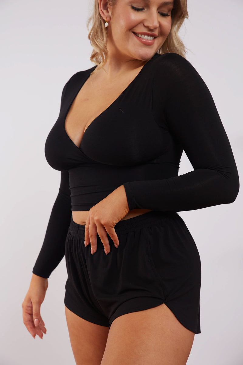 Model in Black Bamboo Wrap Top long sleeves with bust support